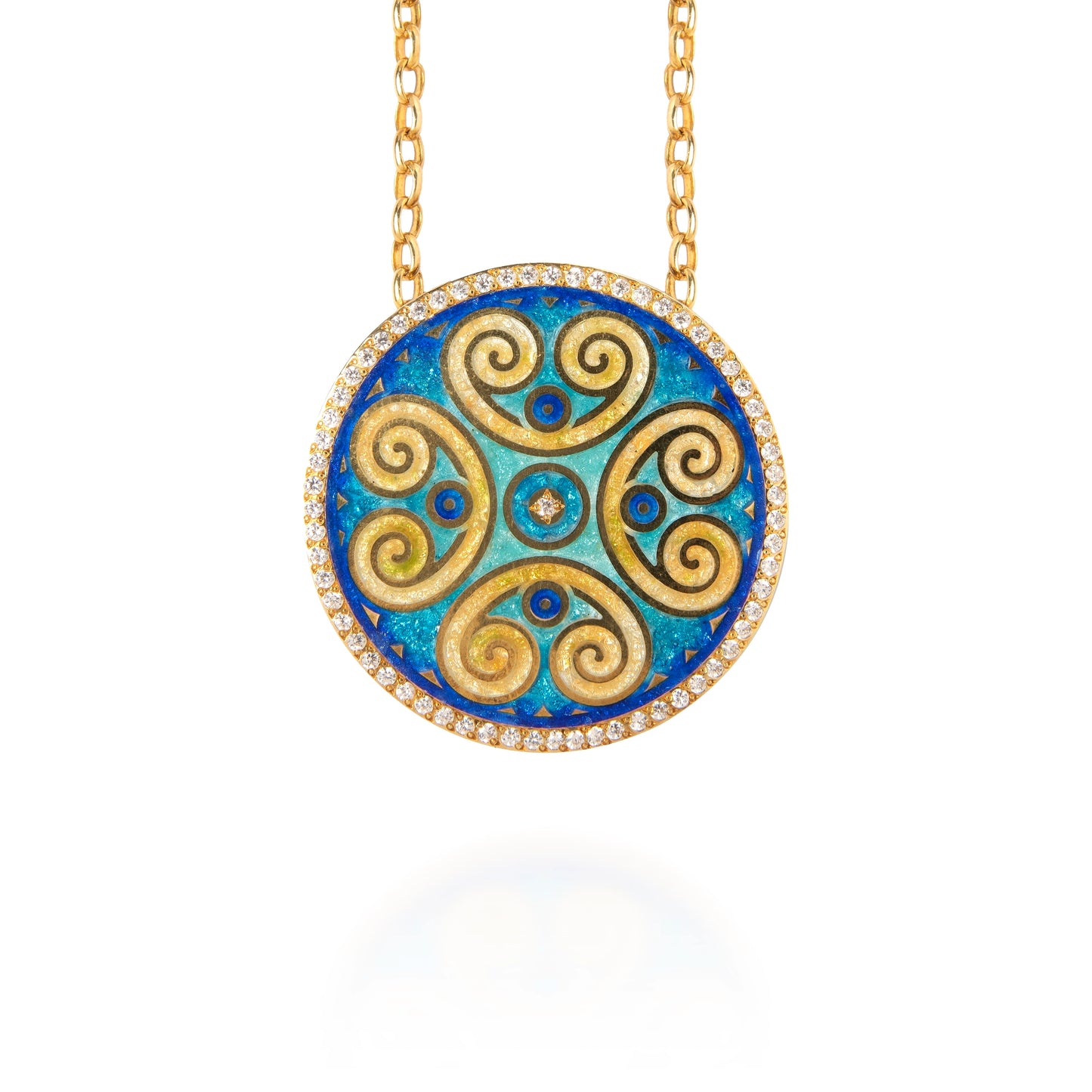 Gold and blue circular pendant necklace on a white background